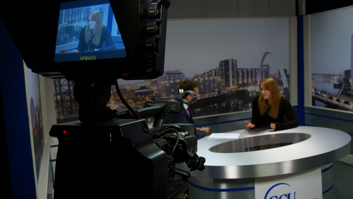 Martin Popplewell hosting a tv interview meeting